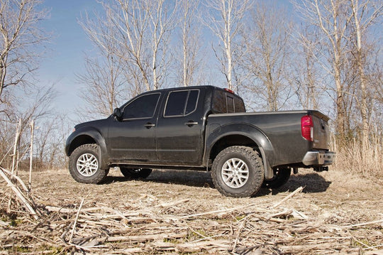 865RED 2.5 Inch Leveling Kit - Red Spacers - Nissan Frontier (05-23)/Xterra (05-15) Rough Country Canada
