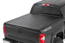 Load image into Gallery viewer, RC46419550 Bed Cover - Tri Fold - Soft - 5'7" Bed - No OE Rail - Toyota Tundra (07-23) Rough Country Canada