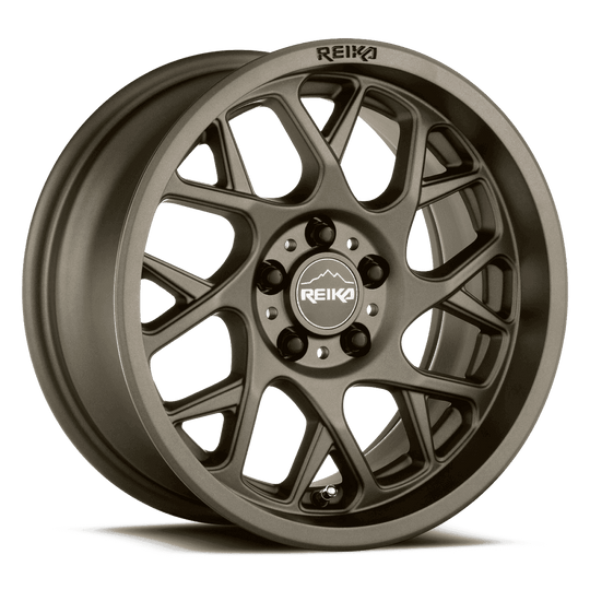 R25570151017F - Reika R25 Detour 15X7 5X100 15mm Bronze - Reika Wheels Canada