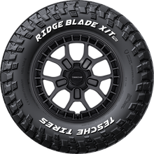 Load image into Gallery viewer, TCXTPCN1 LT215/65R16 Tesche Ridge Blade X/T Pro 103Q Tesche Tires Canada