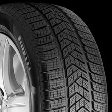 Load image into Gallery viewer, 2852700 265/40R22 Pirelli Scorpion Winter 106W Pirelli Tires Canada