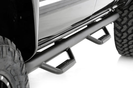 RCC9989QC Nerf Steps - Full Length - Ext - 6.5 Ft Bed - Chevy/GMC 1500/2500HD (99-06 & Classic) Rough Country Canada