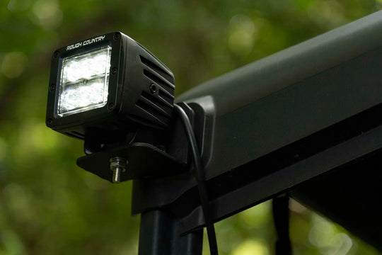 71011 LED Light - Cab Mount - 2" Black Pair - Flood - Can-Am Defender (16-22) Rough Country Canada