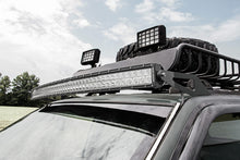 Charger l'image dans la galerie, 70567 LED Light Mount - Upper Windshield - 50" Curved - Jeep Grand Cherokee ZJ (93-98) Rough Country Canada